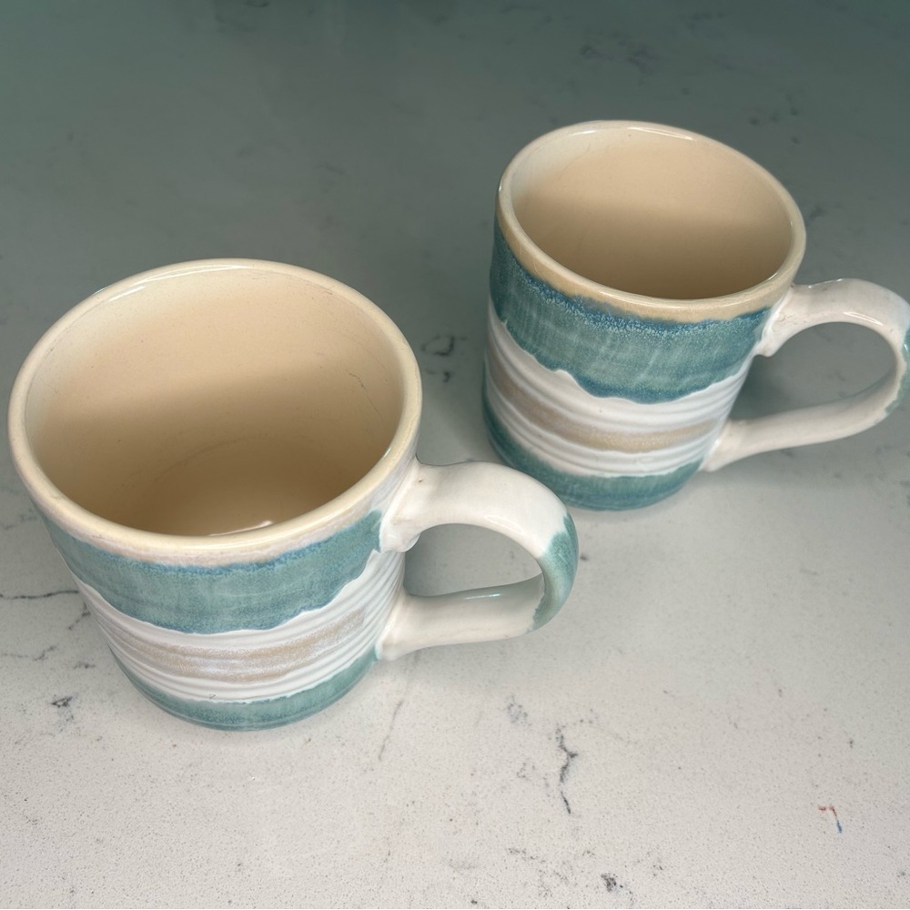 2-Sheffield Home Mugs microwave and dishwasher safe. Both in great condition.